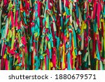 Small photo of Colorful scrappy fabric. Colorful peaces of clothes be bind together on tree by people who believed this will exorcise their fate.
