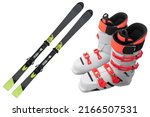 Pair ski boots and alpine skis isolated on white background. Modern sport outdoor equipment isolated. Sport equipment for skiing. 
