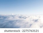 Aerial view White clouds in blue sky. Top. View from drone. Aerial bird