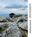 Small photo of Stones on the top of Mount Otorten (1234 meters). Russia, Northern Urals