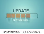 Wooden blocks with the word UPDATE  in loading bar progress.
Business concept for act updating something someone or updated version program.