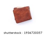 brown leather wallet with banknotes inside isolated on white background , top view , flat lay.