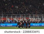 Small photo of Italy, Milan, april 12 2023: starting line up of AC Milan in center field incite each other prior the kick-off during soccer game AC MILAN vs SSC NAPOLI, QF 1st leg UCL 2022-2023 San Siro stadium