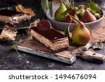 Chocolate pear cake isolated with fruit pear decoration background 
