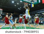 Small photo of KYIV, UKRAINE - NOVEMBER 26, 2017: Ukrainian center Viacheslav Kravtsov finishes alley-oop pass with slam dunk. FIBA European Qualifiers World Cup 2019 Ukraine - Turkey.