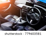 car interior. Modern car speedometer and illuminated dashboard. Luxurious car instrument cluster. Close up shot of hybrid car instrument panel