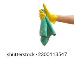 Hand wearing a cleaning glove showing thumb up; cleaning service concept
