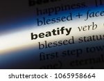 Small photo of beatify word in a dictionary. beatify concept.