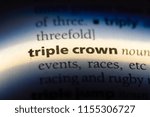 Small photo of triple crown word in a dictionary. triple crown concept.