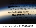 Small photo of quietism word in a dictionary. quietism concept.