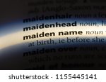 Small photo of maiden name word in a dictionary. maiden name concept.