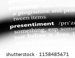 Small photo of presentiment word in a dictionary. presentiment concept.