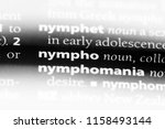 Small photo of nympho word in a dictionary. nympho concept.