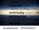 Small photo of entreaty word in a dictionary. entreaty concept, definition.