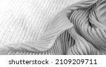 Small photo of tissue, textile, cloth, fabric, web, texture, gray silver corrugation fabric, undulation ripple wave