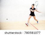 Exercise on the backhand in squash, girl athlete