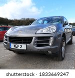 Small photo of 9th October 2020- A sporty Porsche Cayenne S Tiptronic, five door powerful SUV, in the public carpark at Pendine, Carmarthenshire, Wales, UK.