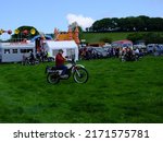 Small photo of 29th May 2022- A man riding a classic Honda XL 250 motorcycle at a classic vehicle show near Newcastle Emlyn, Ceredigion, Wales, UK.