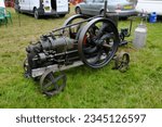 Small photo of 24th June 2023- A vintage Walsh Clark Victoria Oil Engine on display at a classic car show in Pontarcothi, Carmarthenshire, Wales, UK.
