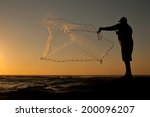 Silhouette Of A Male Throwing A ...