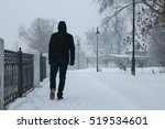 man walking winter. snow blizzard. snow around