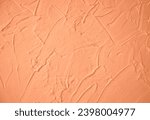 Peach Fuzz toned colour grunge decorative wall background. Art rough stylized texture banner trendy color 2024. Grunge Peach Fuzz color texture