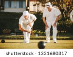 Two Senior Men Playing Boules...