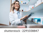 Woman standing in a pharmacy...