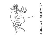 flower gift in hands in... | Shutterstock .eps vector #1853394127