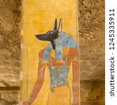 Small photo of The egyptian god Anubis was a protector of graves and an embalmer. KV 14 tomb of Tausert and Setnakht, Egypt, October 21, 2018