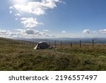 Small photo of A wild camping tent in the mountains of Wales UK Cadair Berwyn