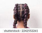 Little girl with Boxer braids, African hair style also known as 