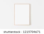 Portrait large 50x70, 20x28, a3,a4, Wooden frame mockup on white wall. Poster mockup. Clean, modern, minimal frame. Empty fra.me Indoor interior, show text or product