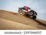 Small photo of Dubai, United Arab Emirates. 12 November 2023. Baja World Cup 2023. Dubai International Baja. Yazeed Al Rajhi - Timo Gottschalk, Toyota Hilux Overdrive, second in the rally.