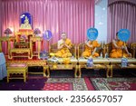 Small photo of BANGKOK, THAILAND – AUGUST 18: A monk chanting the Abhidhamma that is the cornerstone of Buddhism at a Buddhist funeral on August 18, 2023 in Bangkok, Thailand.