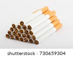 Small photo of cigarette, cigarette on white background, pack of cigarettes, close-up of a cigarette