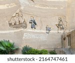 Small photo of Cairo, Egypt - October 22 2016: Mural and Bible verse, engraved on a wall in Saint Samaan The Tanner Monastery, Cairo, Egypt