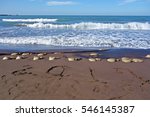 wild waves and 2017 letter on black sand at Samyang black sand beach, jeju island, korea, asia