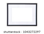 black photo frame mock up on a... | Shutterstock . vector #1043272297