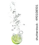 Lime Dropped In Water Isolated...