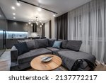 Interior of expensive living room in studio apartments or flat with sofa 