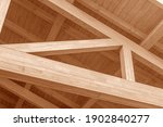 Wooden roof structure. Glued laminated timber roof. Rafters made of wood.