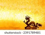 Small photo of Silhouette of asian dragon on abstract golden glittering background. lunar new year horoscope symbol. Chinese dragon - symbol of deity, wisdom, good start, power. element for design. copy space
