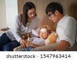 Small photo of family takes care of member sick in bedroom, worry and keep close looing for effective future