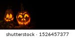 glowing pumpkins in the dark on ... | Shutterstock . vector #1526457377