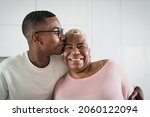 Small photo of Happy mother and son portrait - Parents love and unity concept