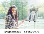 Young Artist Girl Painting A...