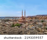 View from the top of the cliff down to the Old Market and Al Sahaba Mosque on the Red Sea promenade in Sharm El Sheikh, Egypt. Beautiful exotic panorama of a tropical Egyptian town