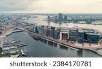 Small photo of Amsterdam, Netherlands - July 22, 2023: Nieuwmarkt en Lastage area. Bay IJ (Amsterdam), Aerial View