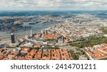 Small photo of Gothenburg, Sweden. River Gota Alv and Rosenlund Canal. Panoramic view of the central part of the city. Summer day. Cloudy weather, Aerial View